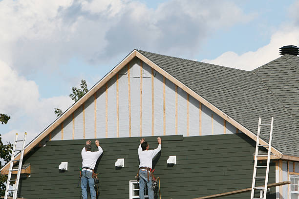 Professional Siding Installation technician working in Timberlake, VA